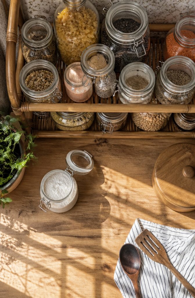 Various jars containing pasta and grains displayed together.