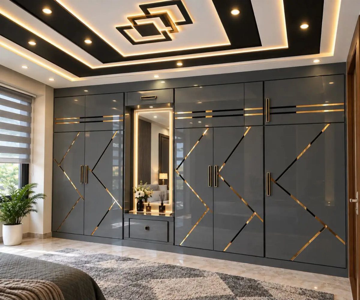 Grey high-gloss wardrobe with gold geometric patterns and a central mirrored vanity unit.
